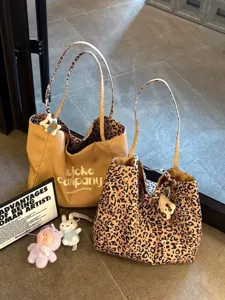 Large capacity leopard print canvas tote bag for women, casual commuter shoulder handbag.