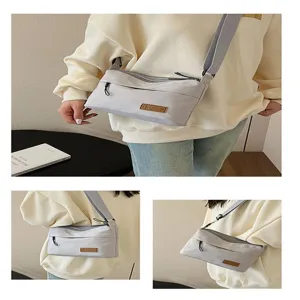 Unisex Japanese style grey canvas crossbody bag with multi layers, wide strap and large capacity.