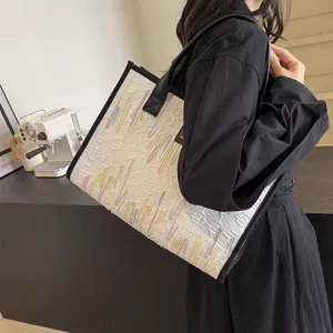 Large capacity canvas tote bag for women, stylish shoulder handbag with colorful embroidery.