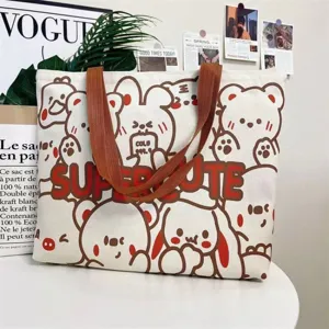 Large capacity canvas tote bag for women, cute cartoon bear print casual shoulder shopping bag.