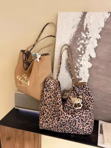 Stylish leopard canvas tote bag for women, large capacity casual shoulder bag and handbag.