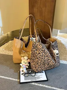 Large capacity leopard print canvas tote bag, trendy casual shoulder commuting handbag for women.