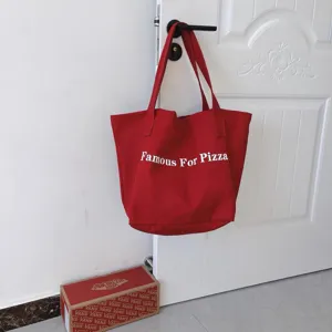 Red canvas tote bag with letter print, casual large capacity shoulder bag for daily use.