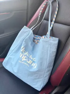 Large capacity canvas tote bag, versatile double-sided casual shoulder bag for commuting students.