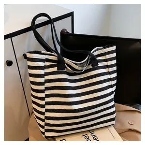 Classic black and white striped canvas tote bag, large capacity daily commuting shoulder bag.