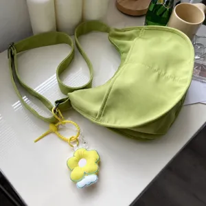 Green crescent shoulder bag with cute yellow flower pendant casual crossbody bag for women