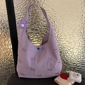 Purple canvas tote bag with embroidered bows and cute crochet flower, casual shoulder bag.