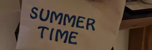 Canvas pouch detail, blue embroidered summer time letter design, durable casual daily bag.