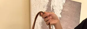 Canvas tote bag handle detail view, premium brown leather trim, durable everyday casual bag.