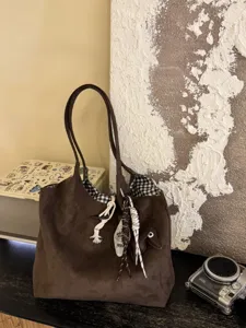 Brown suede shoulder bag detail, vintage large capacity tote with checkered lining decor.