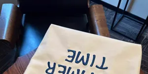 Canvas tote bag with embroidered letters, large capacity casual shoulder bag for daily commute.