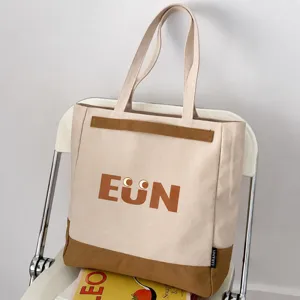 Casual canvas tote bag for women, large capacity shoulder bag for daily commute and school.