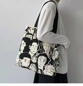 Minimalist black and white face printed canvas tote bag, large capacity daily shoulder bag.