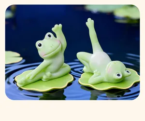 Cute yoga frog resin figurines on lotus leaves for home decor, garden landscaping, desktop.