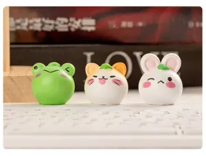 Cute miniature animal ornaments detail shot, resin tiny figures for desktop and micro landscape decor.