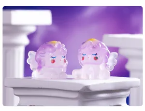 Closeup of cute translucent purple unicorn figurines with wings, perfect for mini gardens.