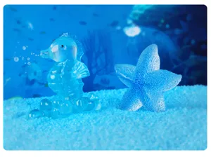 Blue resin seahorse and starfish miniature figurines for aquarium and home decoration.