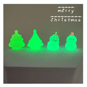 Miniature natalizie luminose brillano al buio resina albero pupazzo di neve fai da te.