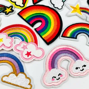 Colorful rainbow and cloud embroidered patches set for cute clothing decoration.