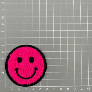 Colorful pink smiley face towel embroidery patch, perfect for clothing and hat decoration.