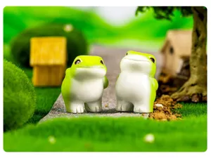 Detailed shot of cute resin frog figurines, perfect for micro landscape and miniature garden decor.
