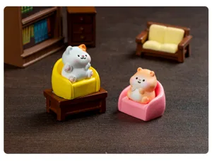 Miniature animal figurine detail scene showcasing cute cat and hamster on tiny colorful sofas.