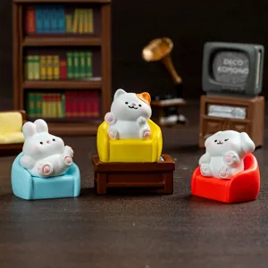 Cute miniature animal figurines sitting on tiny sofas, perfect for desktop and micro landscape decor.