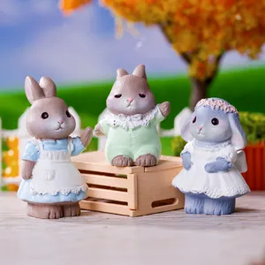 Cute pastoral resin rabbit figurines for home decor and cute garden landscape decoration.