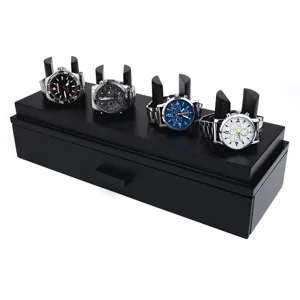 Black wooden watch display box and storage organizer stand with drawer and watch holders.