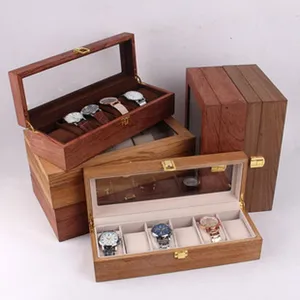 Wooden watch storage box with glass lid and multiple soft grids for watch display.