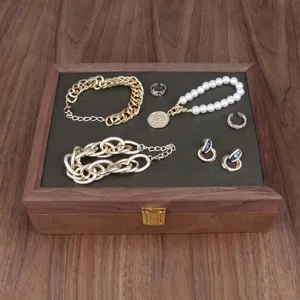 Black walnut wooden jewelry box with velvet lining, storage for rings and bracelets safely.
