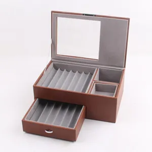 Multi-layer brown leather watch and jewelry storage box with glass lid and drawer organizer.