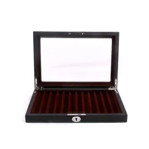 Close-up of wooden pen display box with glass lid and soft velvet interior slots for collection.