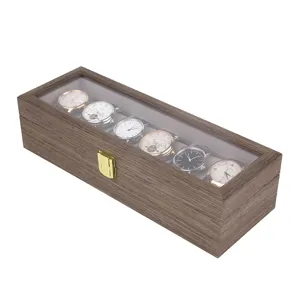 Wooden 6-slot watch display box with glass top, vintage walnut finish and gold clasp storage.