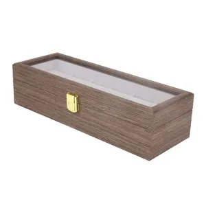Wooden watch storage box detail view, 6 slots with clear glass lid and metal clasp.