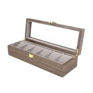 Wooden 6 slot watch display box with glass lid and soft velvet pillows for storage.
