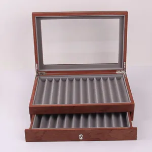 Scatola per penne in legno vintage con coperchio in vetro e cassetto portaoggetti.