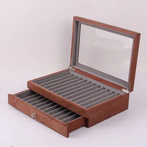 Scatola espositore per penne in legno retro con coperchio trasparente e un comodo cassetto.