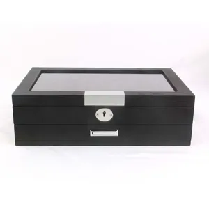Wooden pen display box detail, black storage showcase with glass top and metal lock.