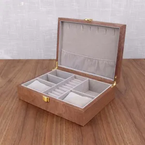 Wooden watch jewelry box with compartments, ring slots and velvet interior for storage.