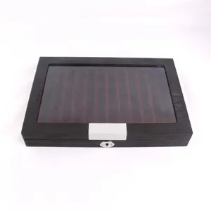 Close-up detail of the wooden fountain pen display storage box with clear glass lid.