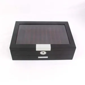 Wooden pen display storage box with clear glass top and secure metal lock detail.