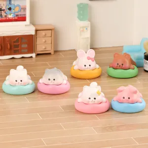 Cute miniature sleeping animal resin figurines on floaties for cute desk and car decor.