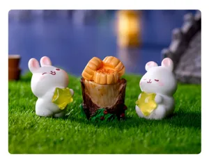 Adorables figurines de lapin et étoiles, parfaites décorations de bureau miniature design.