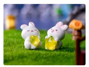 Figurines de mini lapins mignons tenant des étoiles pour micro paysage et déco de bureau.