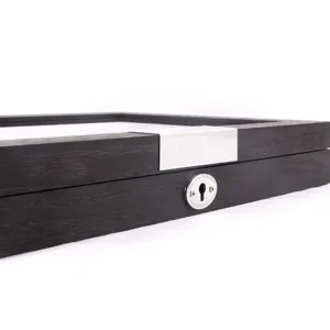 Wooden pen storage box detail shot, premium black wood finish with silver metal lock.