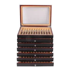 Multi-layer wooden pen display case with glass top and drawers for large fountain pen collection.