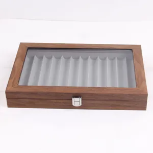Wooden pen display box detail view showing 12 slots, clear glass lid and metal clasp lock.