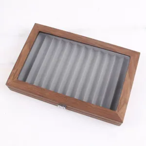 Wooden 12-slot pen display storage box with clear glass lid and gray velvet interior tray.