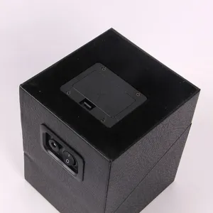 Details of black PU leather single watch winder battery compartment and power switch.
